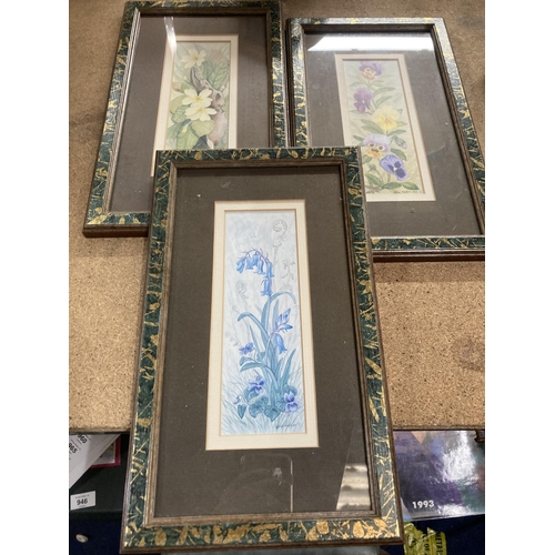 929 - A GROUP OF THREE FRAMED FLORAL PRINTS