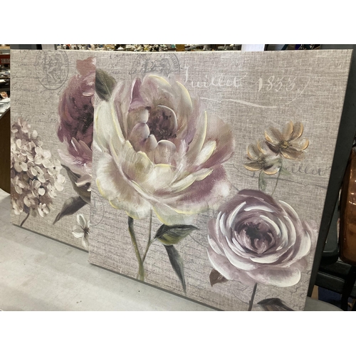 949 - A PAIR OF MODERN FLORAL CANVAS PRINTS AND A MODERN MIRROR