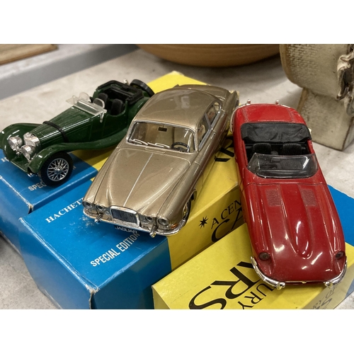 954 - THREE BOXED CORGI 'A CENTURY OF CARS' TO INCLUDE A JAGUAR E TYPE, SS100 AND AN MK10