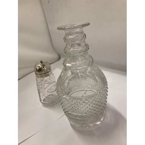 129 - A GLASS DECANTER AND A SUGAR SIFTER WITH PLATED LID