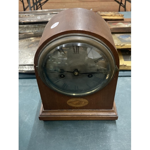 137 - THREE VINTAGE MAHOGANY AND OAK CASED MANTLE CLOCKS