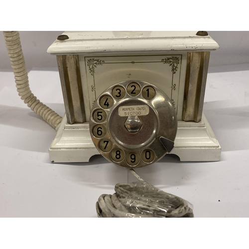 141 - A VINTAGE ITALIAN TELEPHONE WITH GILT DESIGN