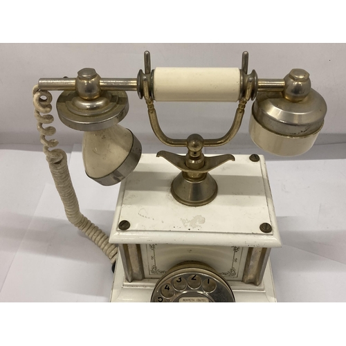 141 - A VINTAGE ITALIAN TELEPHONE WITH GILT DESIGN