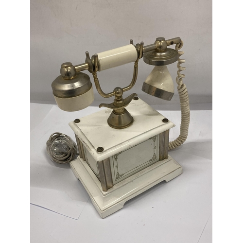 141 - A VINTAGE ITALIAN TELEPHONE WITH GILT DESIGN