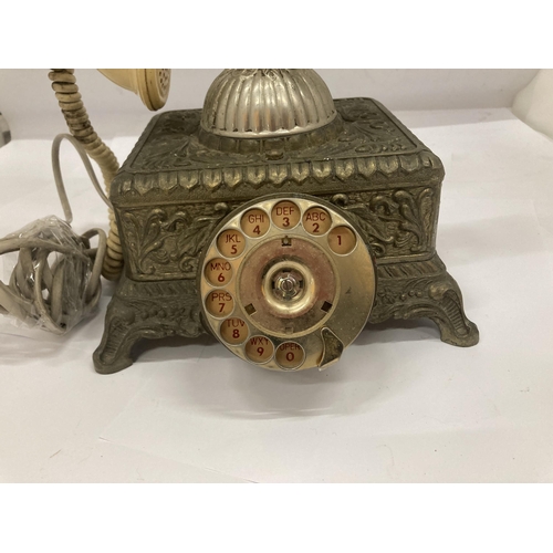 156 - A HEAVY VINTAGE BRASS ORNATE TELEPHONE