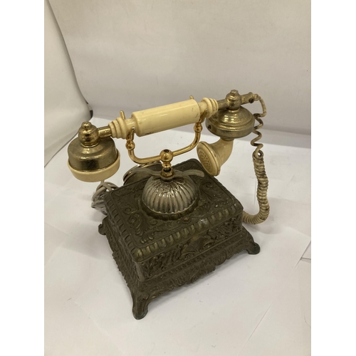 156 - A HEAVY VINTAGE BRASS ORNATE TELEPHONE