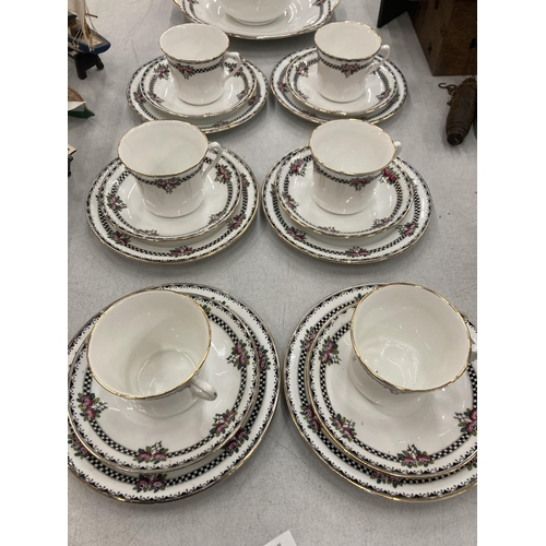 157 - A VICTORIAN CHINA TEASET TO INCLUDE CAKE PLATE, SUGAR BOWL, CREAM JUG, CUPS, SAUCERS AND SIDE PLATES