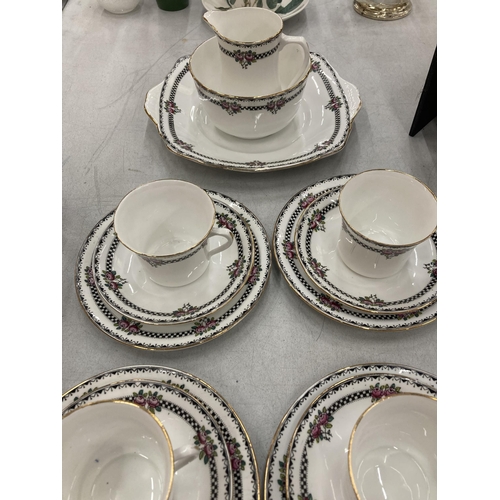 157 - A VICTORIAN CHINA TEASET TO INCLUDE CAKE PLATE, SUGAR BOWL, CREAM JUG, CUPS, SAUCERS AND SIDE PLATES