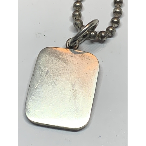 619 - A SILVER INGOT AND NECKLACE IN A PRESENTATION BOX