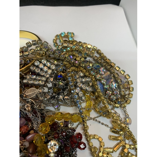 631 - A LARGE QUANTITY OF COSTUME JEWELLERY