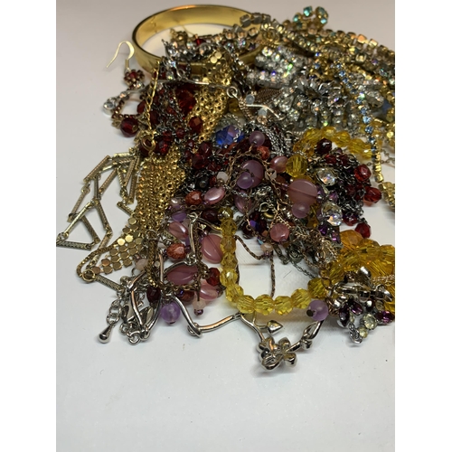 631 - A LARGE QUANTITY OF COSTUME JEWELLERY