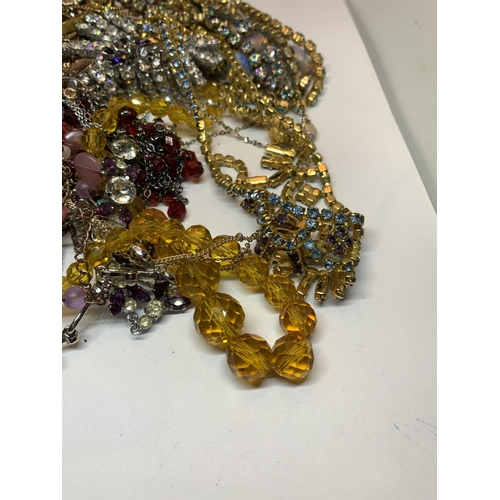 631 - A LARGE QUANTITY OF COSTUME JEWELLERY