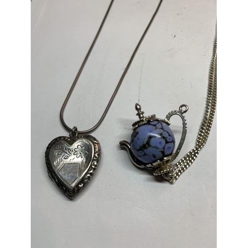 633 - FOUR SILVER NECKLACES WITH PENDANTS