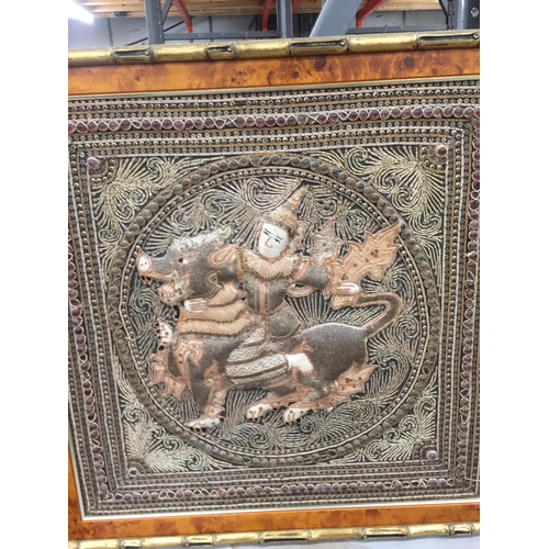 1043 - AN ORIENTAL NEEDLEWORK IN A WALNUT AND BAMBOO STYLE FRAME, 62CM X 62CM