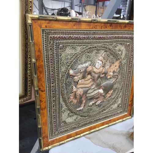 1043 - AN ORIENTAL NEEDLEWORK IN A WALNUT AND BAMBOO STYLE FRAME, 62CM X 62CM