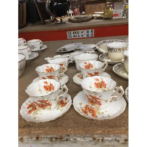 1057 - A VICTORIAN PART TEASET TO INCLUDE FOUR CUPS AND SAUCERS, A CREAM JUG AND SUGAR BOWL PLUS A CHINA TE... 