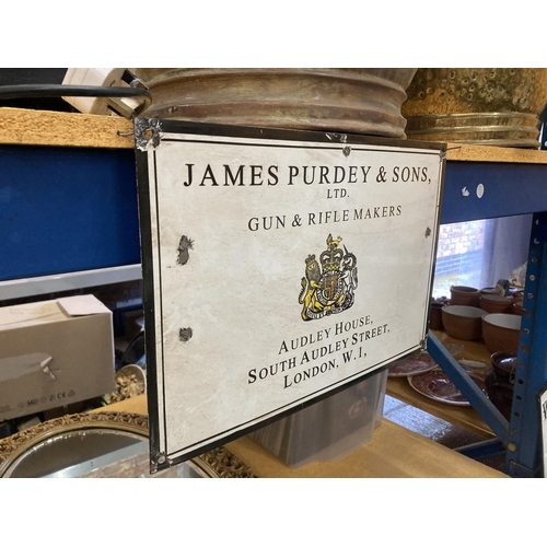 835 - AN ENAMEL SIGN 'JAMES PURDEY & SONS', 38CM X 26CM