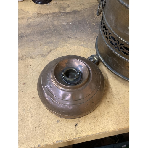 838 - A LARGE BRASS LIDDED COAL BUCKET WITH LIONS HEAD HANDLES PLUS A COPPER FOOT WARMER