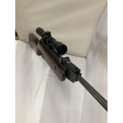 870 - A .22 SPANISH AIR RIFLE WITH 4 X 32 TELESCOPIC SIGHTS