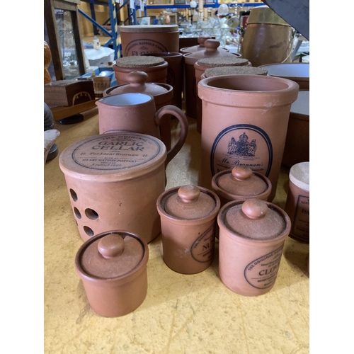 881 - A LARGE COLLECTION OF TERRACOTTA STORAGE JARS AND BOWLS, THE MAJORITY BY HENRY WATSON POTTERY