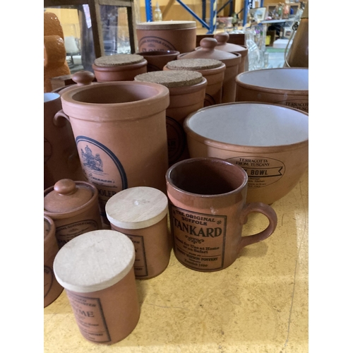 881 - A LARGE COLLECTION OF TERRACOTTA STORAGE JARS AND BOWLS, THE MAJORITY BY HENRY WATSON POTTERY