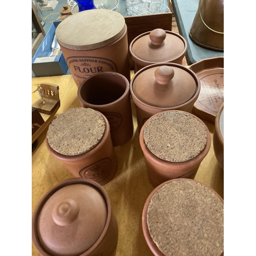 881 - A LARGE COLLECTION OF TERRACOTTA STORAGE JARS AND BOWLS, THE MAJORITY BY HENRY WATSON POTTERY