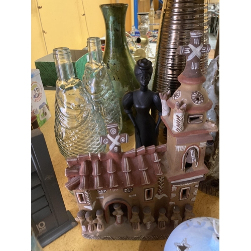 883 - A MIXED LOT TO INCLUDE GLASS FISH SHAPED BOTTLES, VASES, A TERACOTTA CHURCH, VASES, LADY FIGURE, ETC