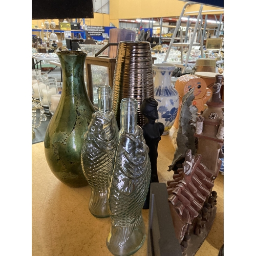 883 - A MIXED LOT TO INCLUDE GLASS FISH SHAPED BOTTLES, VASES, A TERACOTTA CHURCH, VASES, LADY FIGURE, ETC