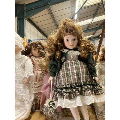 888 - A GROUP OF DOLL MODELS ON STANDS WITH A BOXED EXAMPLE