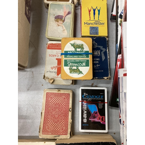 902 - ELEVEN VINTAGE PACKS OF PLAYING CARDS AND FOUR BRIDGE BOOKS