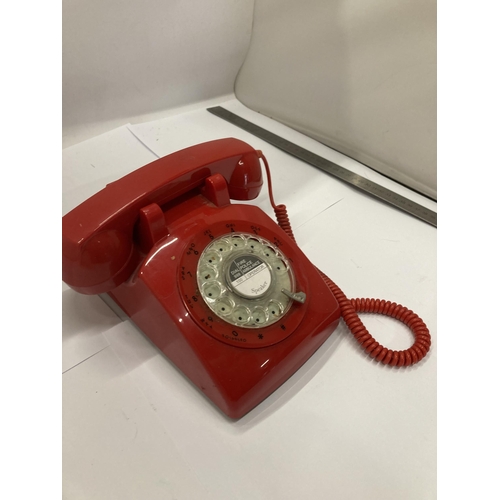 904 - A VINTAGE RED TELEPHONE