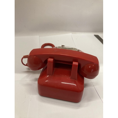 904 - A VINTAGE RED TELEPHONE