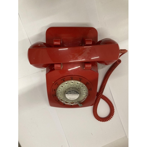 904 - A VINTAGE RED TELEPHONE