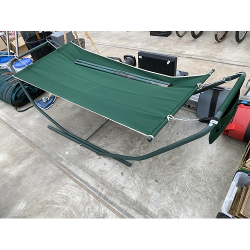 2015 - A METAL FRAMED SWINGING HAMMOCK