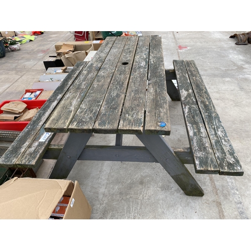 2023 - A WOODEN SLATTED GARDEN PICNIC BENCH AND TABLE