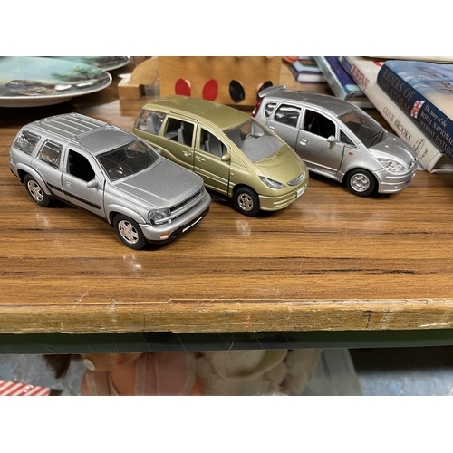 1112 - THREE DIE-CAST CARS TO INCLUDE A MITSUBISHI COLT