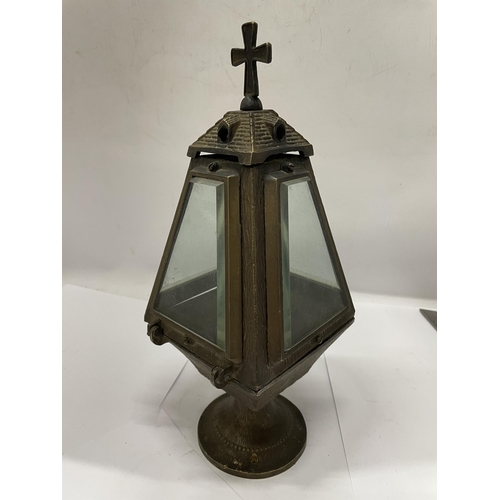 180A - A BRASS CHURCH LANTERN WITH BEVELLED GLASS