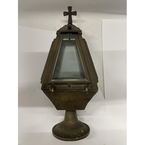 180A - A BRASS CHURCH LANTERN WITH BEVELLED GLASS