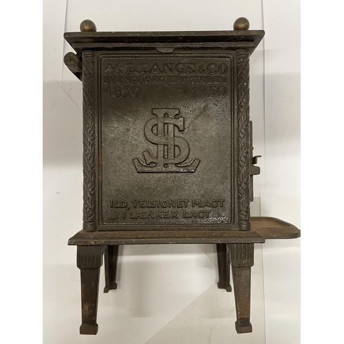 183A - A SALESMAN'S SAMPLE CAST IRON STOVE