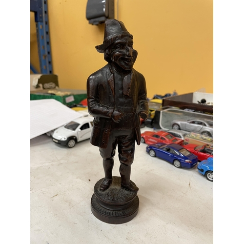 232A - A 19TH CENTURY WOODEN FIGURAL NUTCRACKER FIGURE