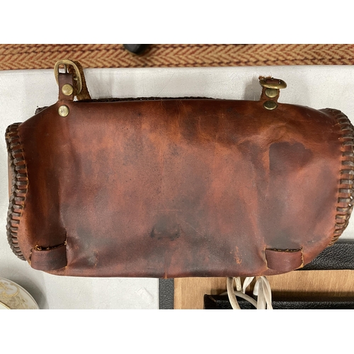 249A - A VINTAGE TRIUMPH LEATHER MOTORBIKE BAG