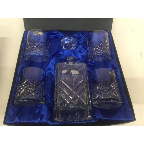 68 - A BOHEMIA CRYSTAL DECANTER WITH FOUR WHISKY TUMBLERS IN A PRESENTATION BOX