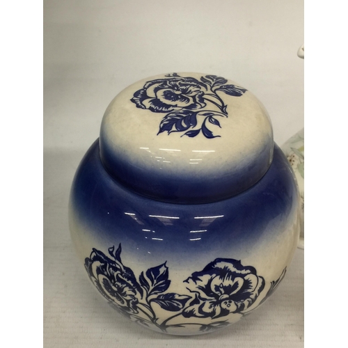 767 - A CARLTONWARE LIDDED GINGER JAR, A ROYAL DOULTON JULIE FIGURE AND A FLORAL VINEGAR BOTTLE