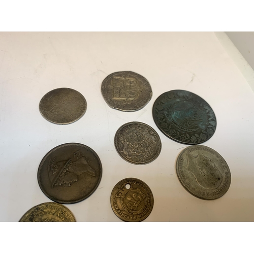 322 - FOURTEEN VARIOUS FOREIGN COINS AND TOKENS