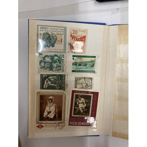 330 - A VINTAGE STAMP ALBUM WITH BRITISH AND WORLDWIDE STAMPS AND TWO FURTHER SMALLER ALBUMS