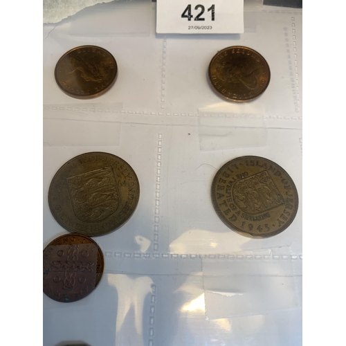 421 - TWENTY ASSORTED WORLD COINS BELIEVED TO CONTAIN- ISLE OF MAN, JERSEY ETC, DATES RANGING 1935-1984