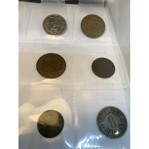 421 - TWENTY ASSORTED WORLD COINS BELIEVED TO CONTAIN- ISLE OF MAN, JERSEY ETC, DATES RANGING 1935-1984