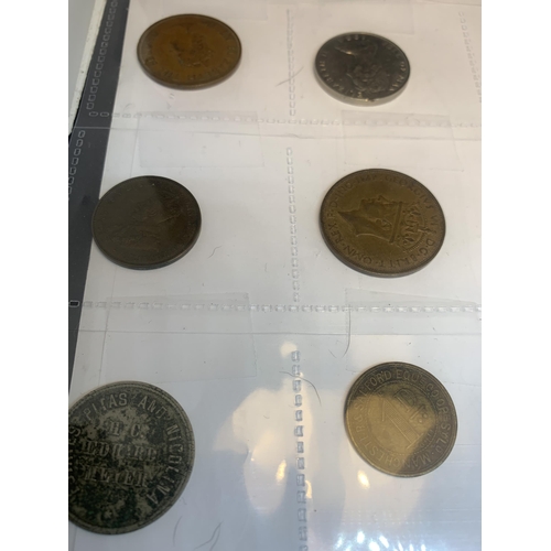 421 - TWENTY ASSORTED WORLD COINS BELIEVED TO CONTAIN- ISLE OF MAN, JERSEY ETC, DATES RANGING 1935-1984