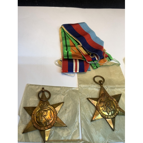 424 - FIVE WORLD WAR II MEDALS - DEFENCE MEDAL, 3 X 1939-1945 STARS & 1939-1945 WAR MEDAL