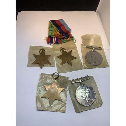 424 - FIVE WORLD WAR II MEDALS - DEFENCE MEDAL, 3 X 1939-1945 STARS & 1939-1945 WAR MEDAL